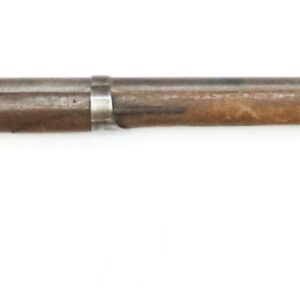 The Chattanooga Arsenal Conversion Musket is a vintage, single-shot, muzzle-loading rifle with a wooden stock and metal barrel, displayed in side profile against a white background.