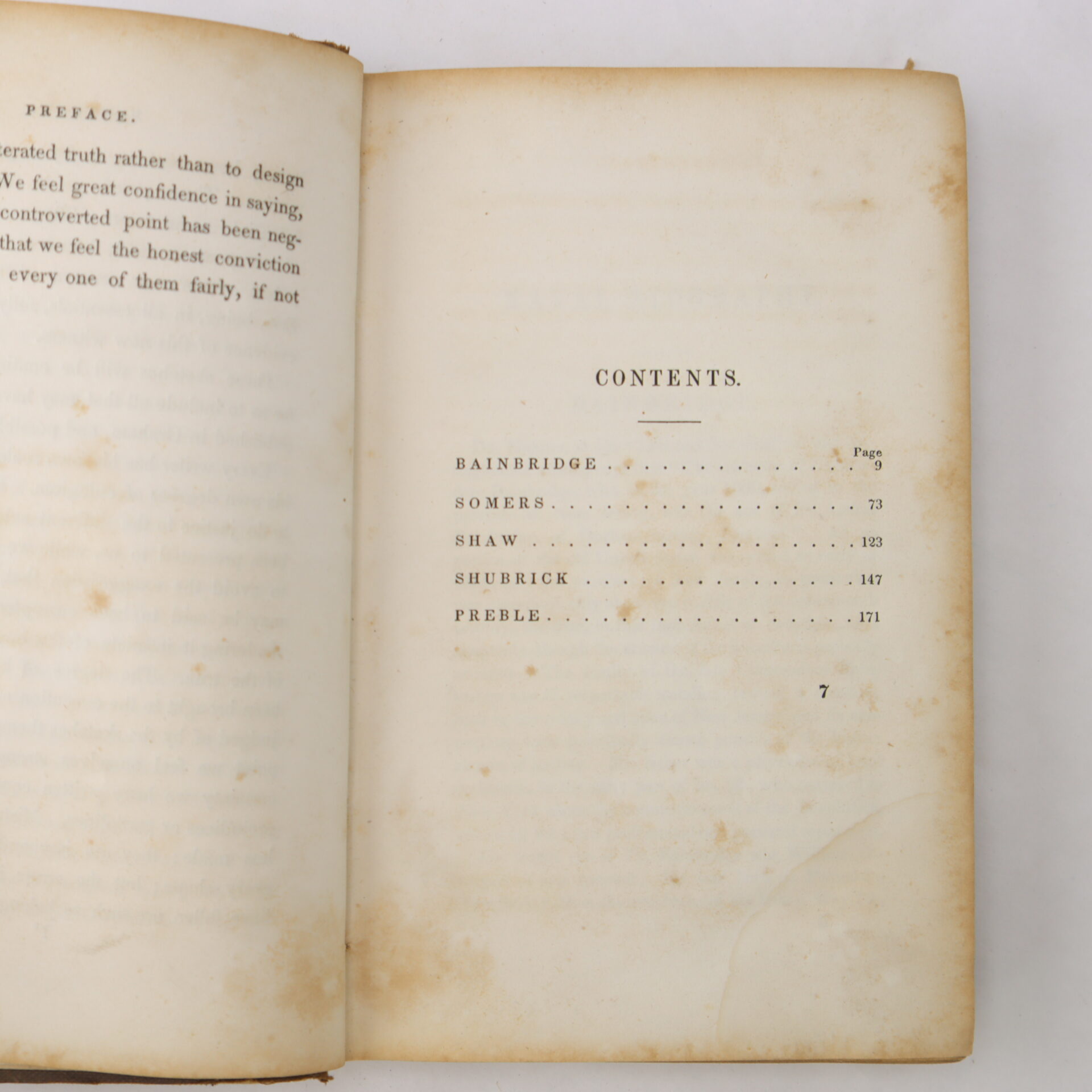 An open book showing a table of contents listing Bainbridge, Somers, Shaw, Shubrick, and Preble with corresponding page numbers on the right page.