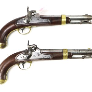 Two vintage flintlock pistols with wooden handles, brass accents, and metal barrels, displayed side by side on a white background.