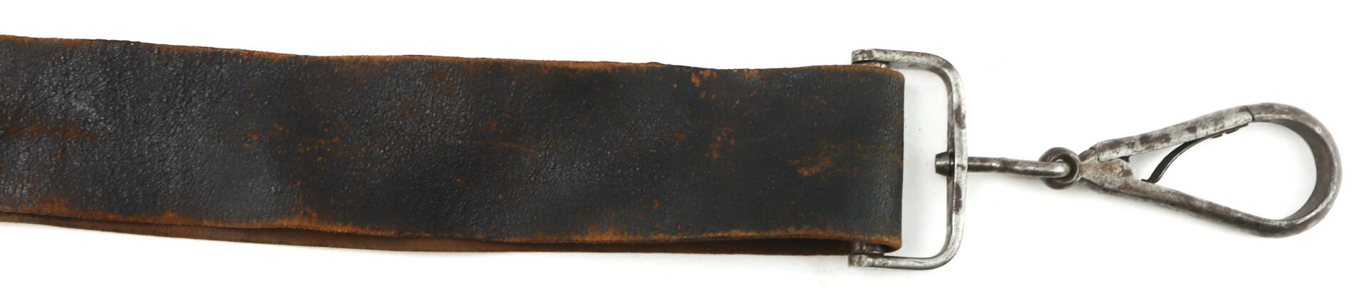 A worn, dark brown leather strap with a metal clip attached to one end, isolated on a white background.