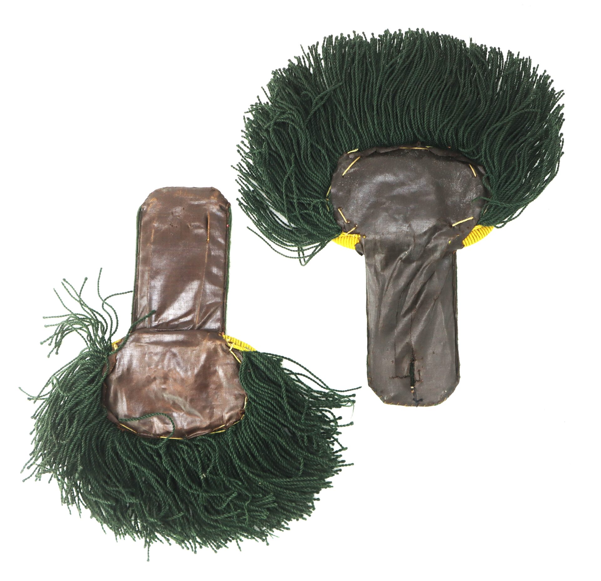 Two military shoulder epaulettes with dark green fringe and brown leather backing, displayed side by side on a white background.