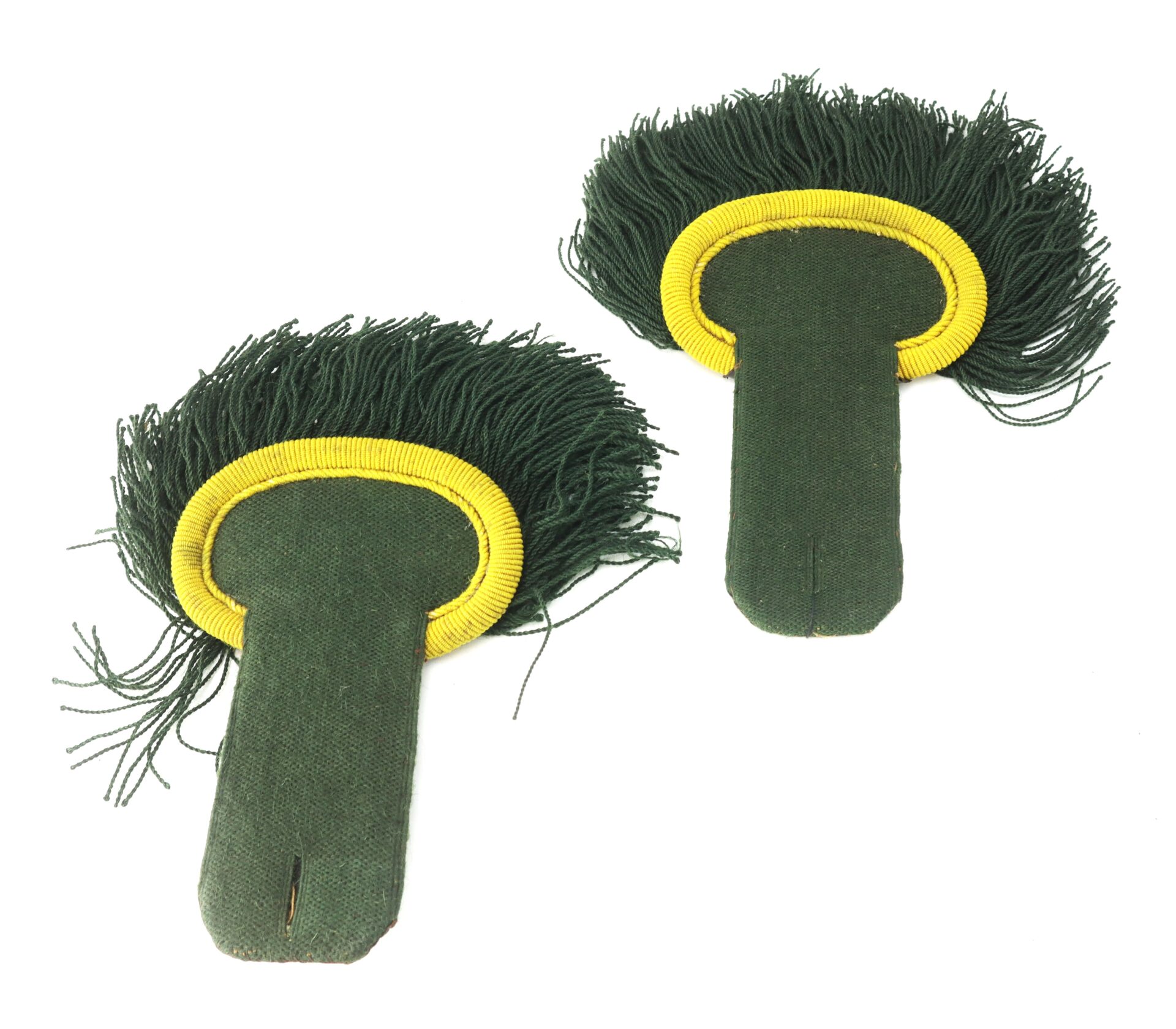 A pair of green fabric military epaulettes with yellow trim and fringe, laid side by side on a white background.