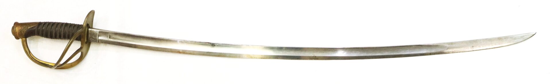 A curved, single-edged sword with a brass guard and a dark-wrapped handle, displayed on a white background.
