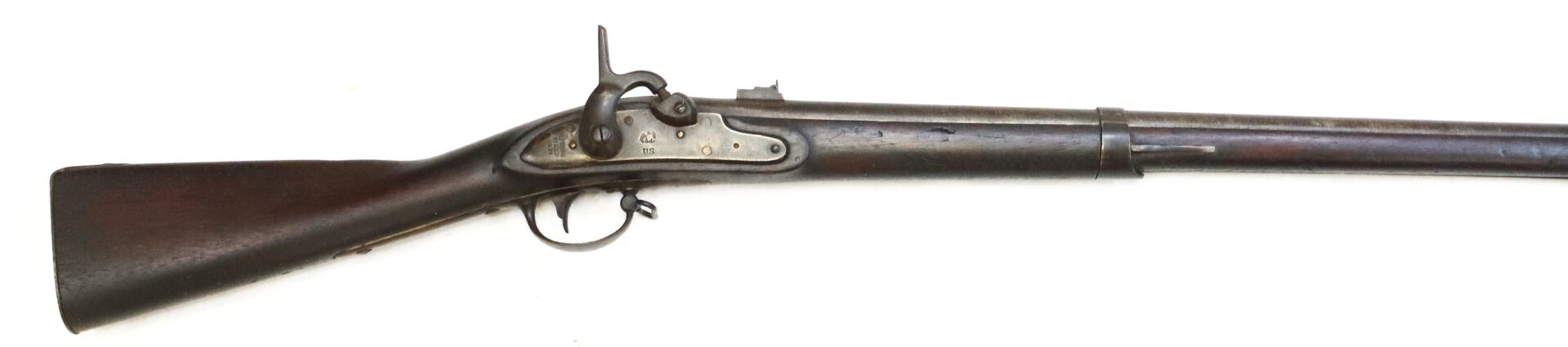 Antique muzzle-loading rifle with a wooden stock, metal barrel, and external hammer mechanism, photographed on a white background.