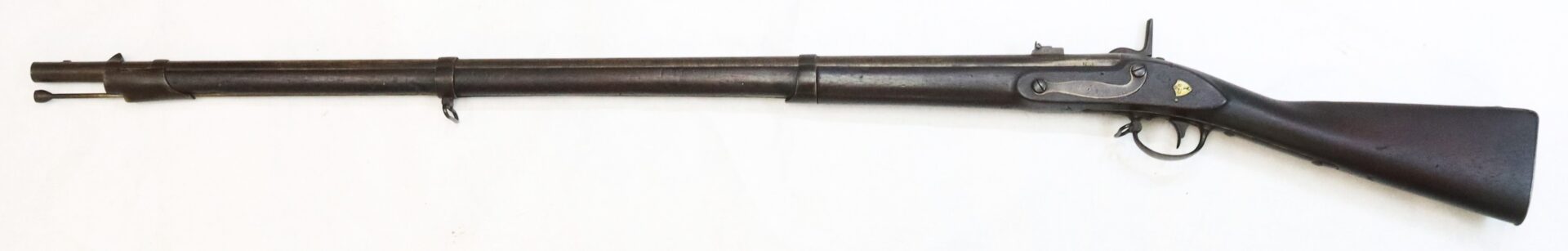 A vintage, long-barreled musket with a wooden stock and metal barrel, displayed on a plain white background.