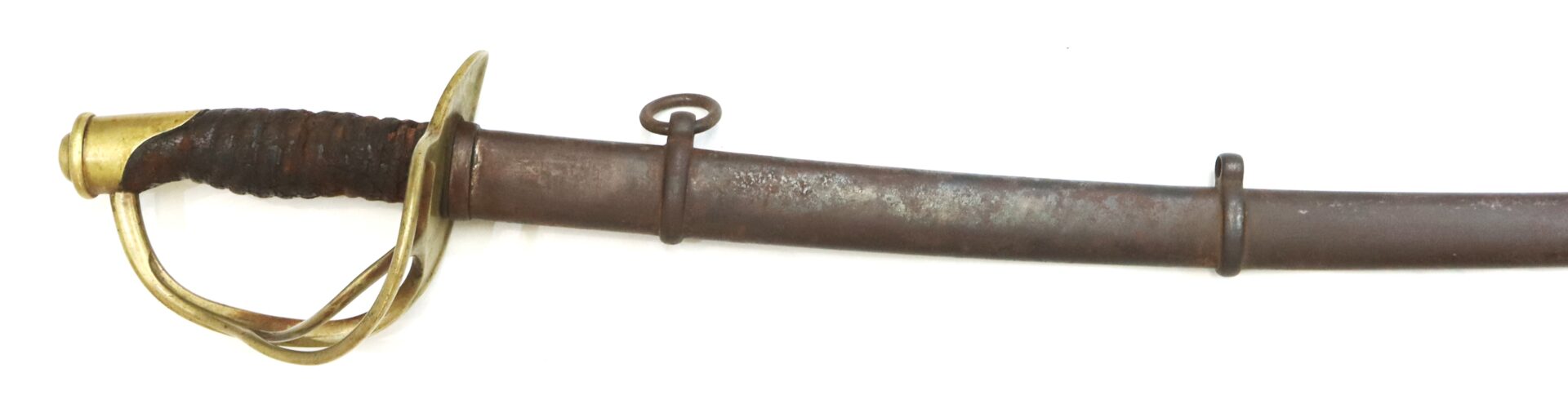 A vintage cavalry sword with a brass hilt and a dark, worn metal scabbard featuring two suspension rings.
