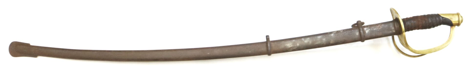 A vintage cavalry saber with a curved blade, brass guard, and worn leather-wrapped handle, sheathed in a metal scabbard.