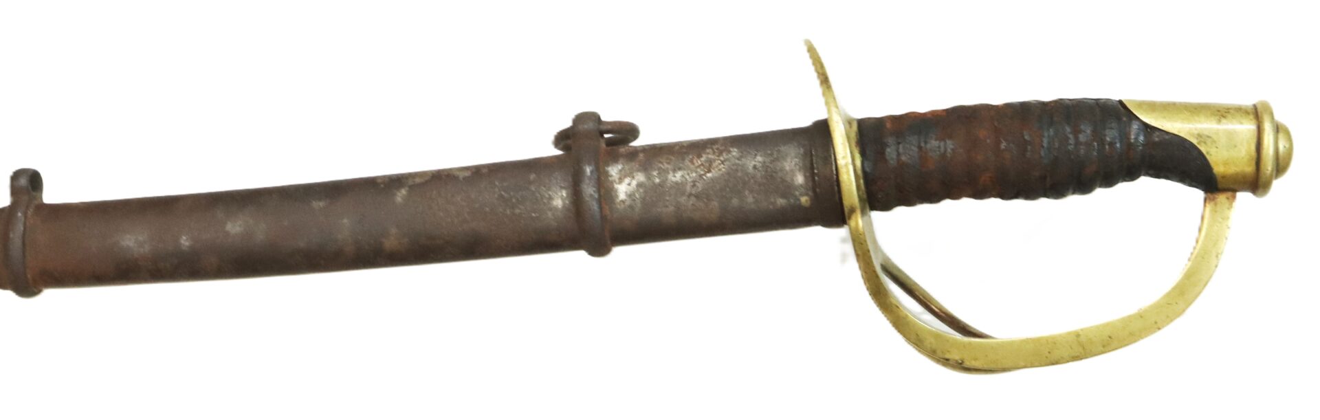 A rusted sword with a curved brass handguard and a worn, dark handle, partially sheathed in a rusted metal scabbard.