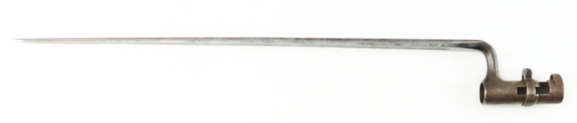 The Model 1855 .58 Caliber Triangular Socket Bayonet features a long, narrow triangular blade with a metal socket and a curved handle attachment.