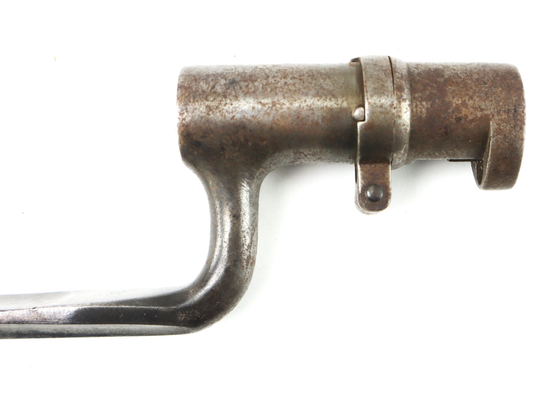 Close-up of a rusted Model 1855 .58 Caliber Triangular Socket Bayonet, featuring a cylindrical socket, photographed against a white background.