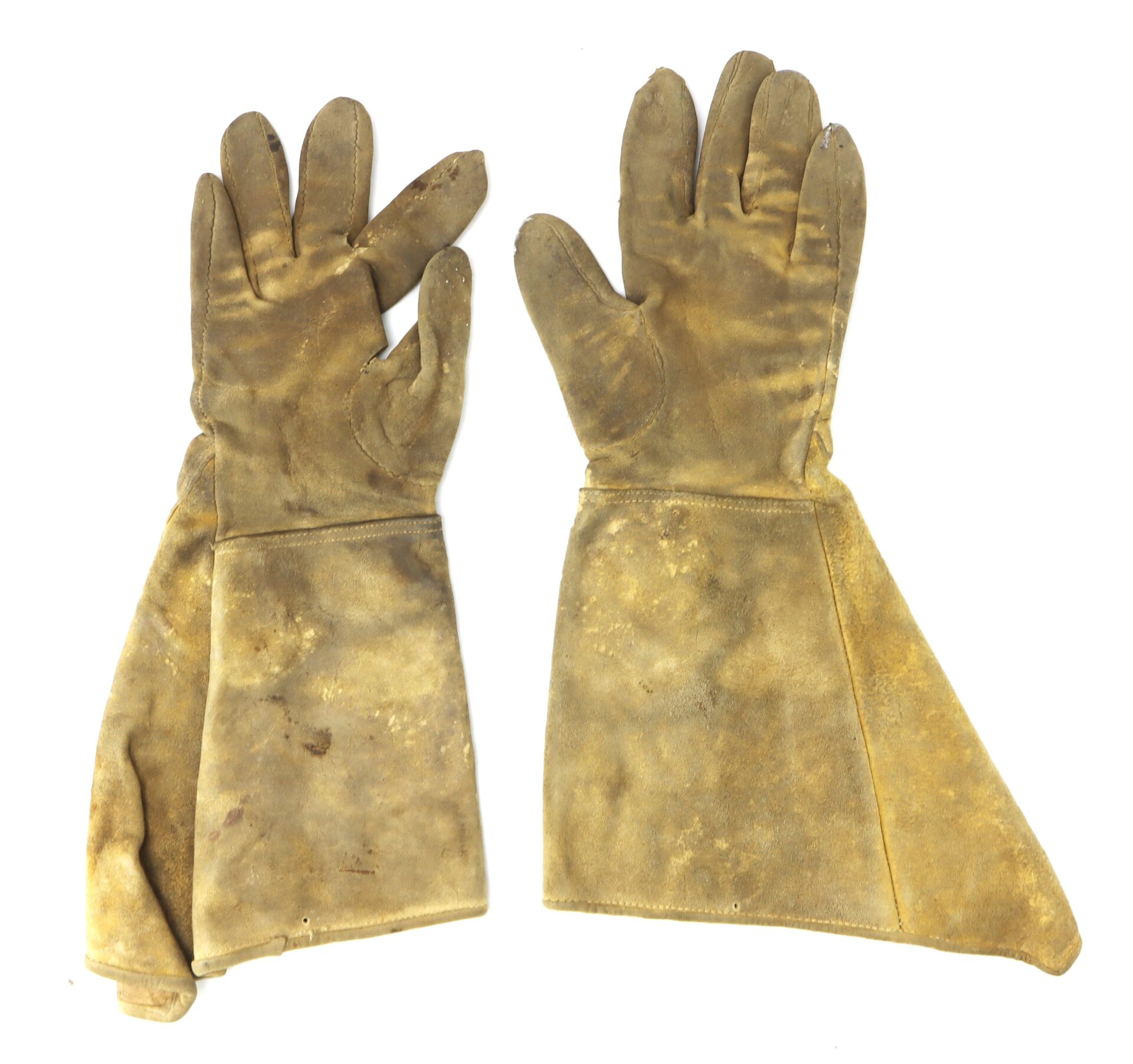 A pair of worn, brown leather gloves with long cuffs, displayed side by side on a white background.