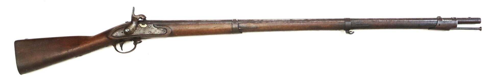 A vintage, wooden-stocked musket with a long barrel, side-mounted hammer, and metal fittings, displayed on a white background.