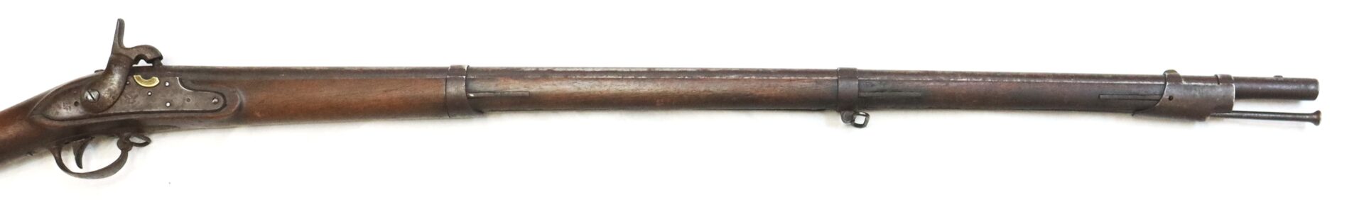 Side view of an antique, long-barreled muzzle-loading rifle with a wooden stock, metal barrel bands, and a side-mounted hammer mechanism.