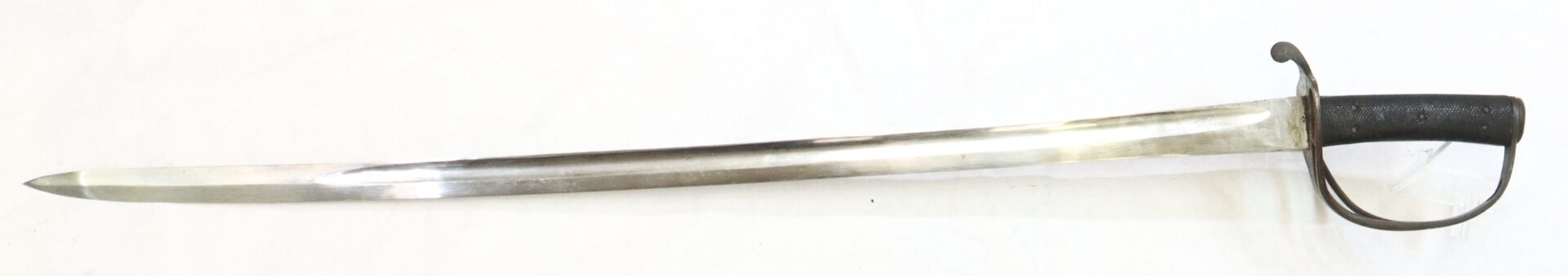 A long, curved sword with a metal blade, black textured handle, and a simple hand guard, displayed on a white background.