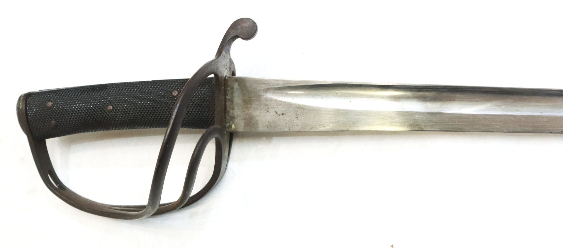 A close-up of a sword with a black textured handle, metal hand guard, and a shiny, straight blade against a white background.