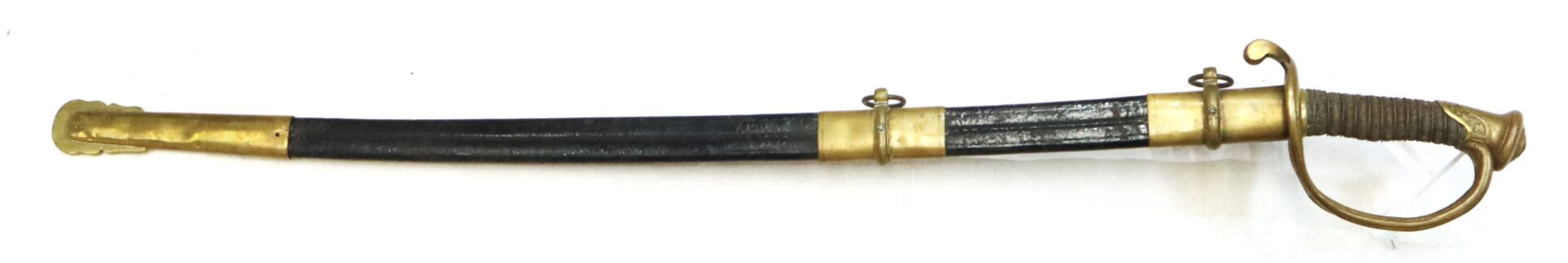 A curved sword with a brass hilt and guard, featuring a black scabbard with brass fittings and two suspension rings.
