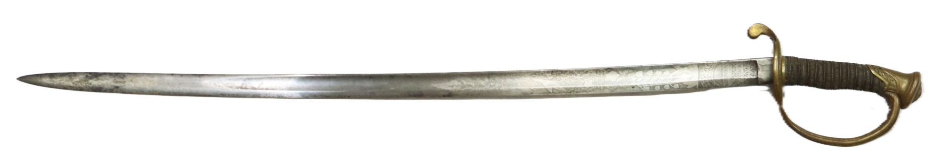 A vintage sword with a curved steel blade, a decorative brass hilt, and a handguard, shown against a white background.
