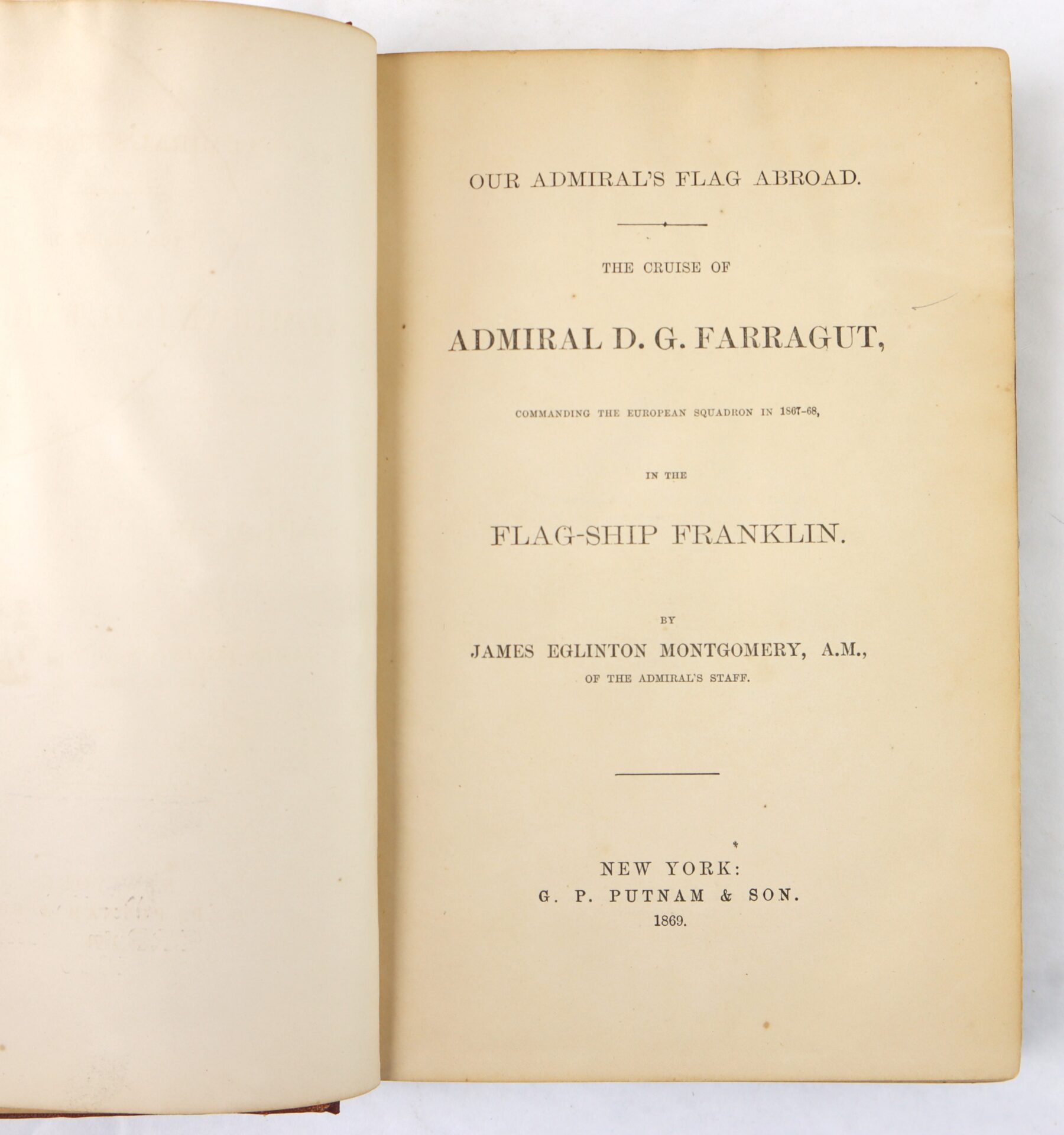Open book showing the title page for "Our Admiral's Flag Abroad" by James Eglinton Montgomery, published by G. P. Putnam & Son, New York, 1869.