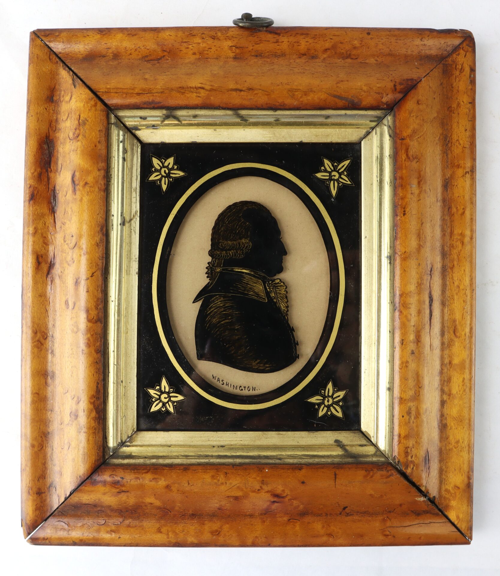Framed silhouette portrait of a man in profile, labeled "Washington," with a decorative wooden and black border featuring gold floral accents.