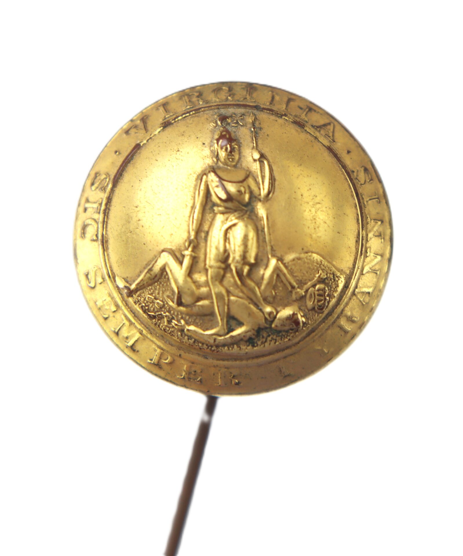 Gold pin featuring the Virginia state seal, depicting a woman standing over a fallen figure with the motto "Sic Semper Tyrannis" inscribed around the edge.