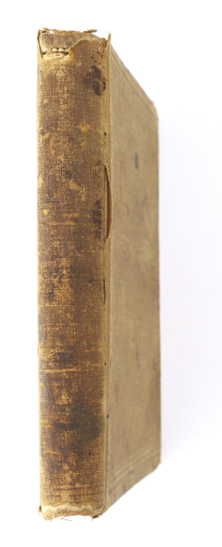 A worn, brown hardcover book standing upright against a white background, showing visible signs of age and use.
