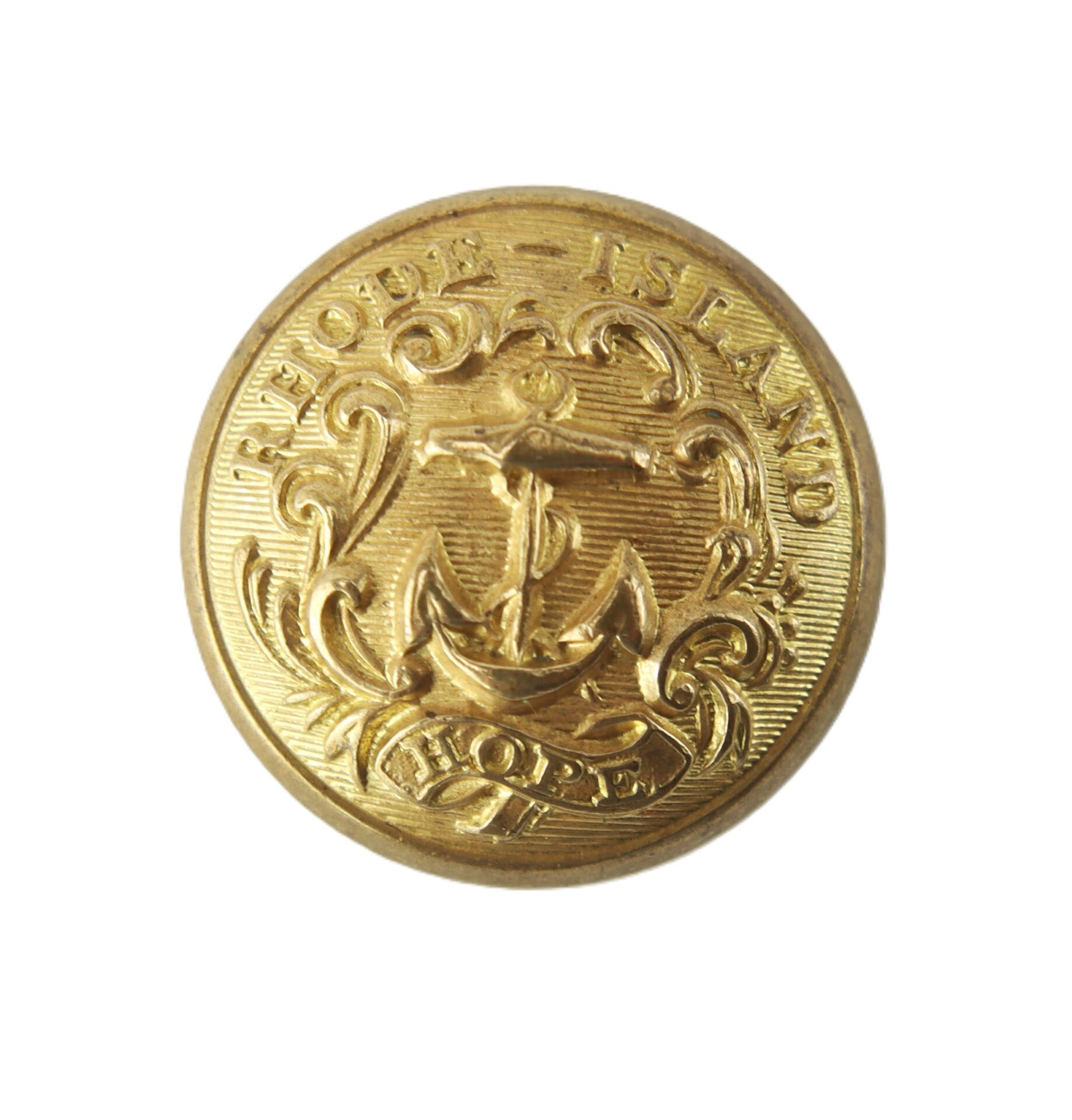 A gold button featuring an anchor, ornate detailing, and the words "RHODE ISLAND" and "HOPE" engraved on it.
