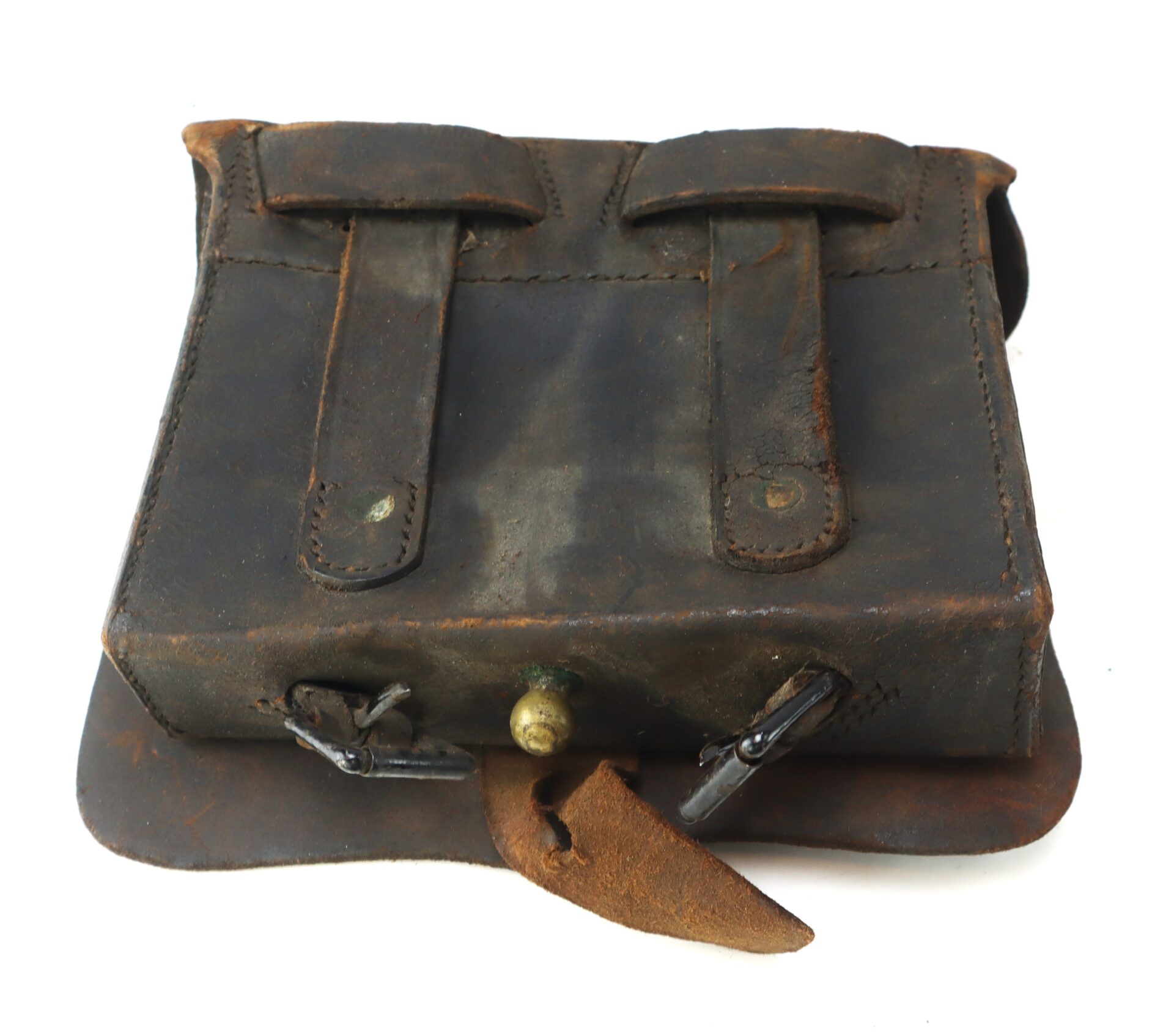 A worn, dark leather satchel with two front straps, metal clasps, and visible stitching, placed on a white background.