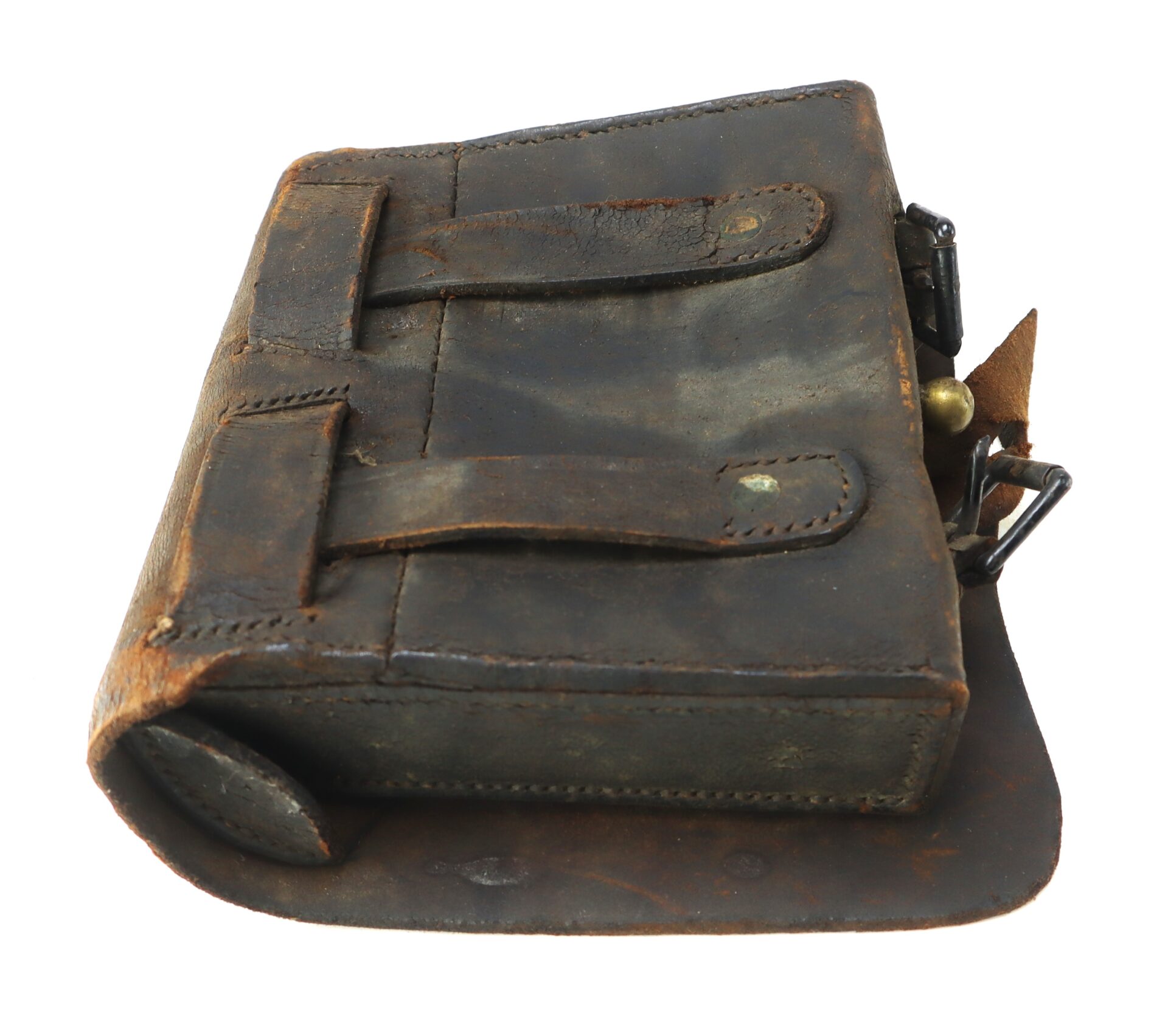 A worn, rectangular leather pouch with two straps and visible stitching, featuring some metal hardware and signs of aging.