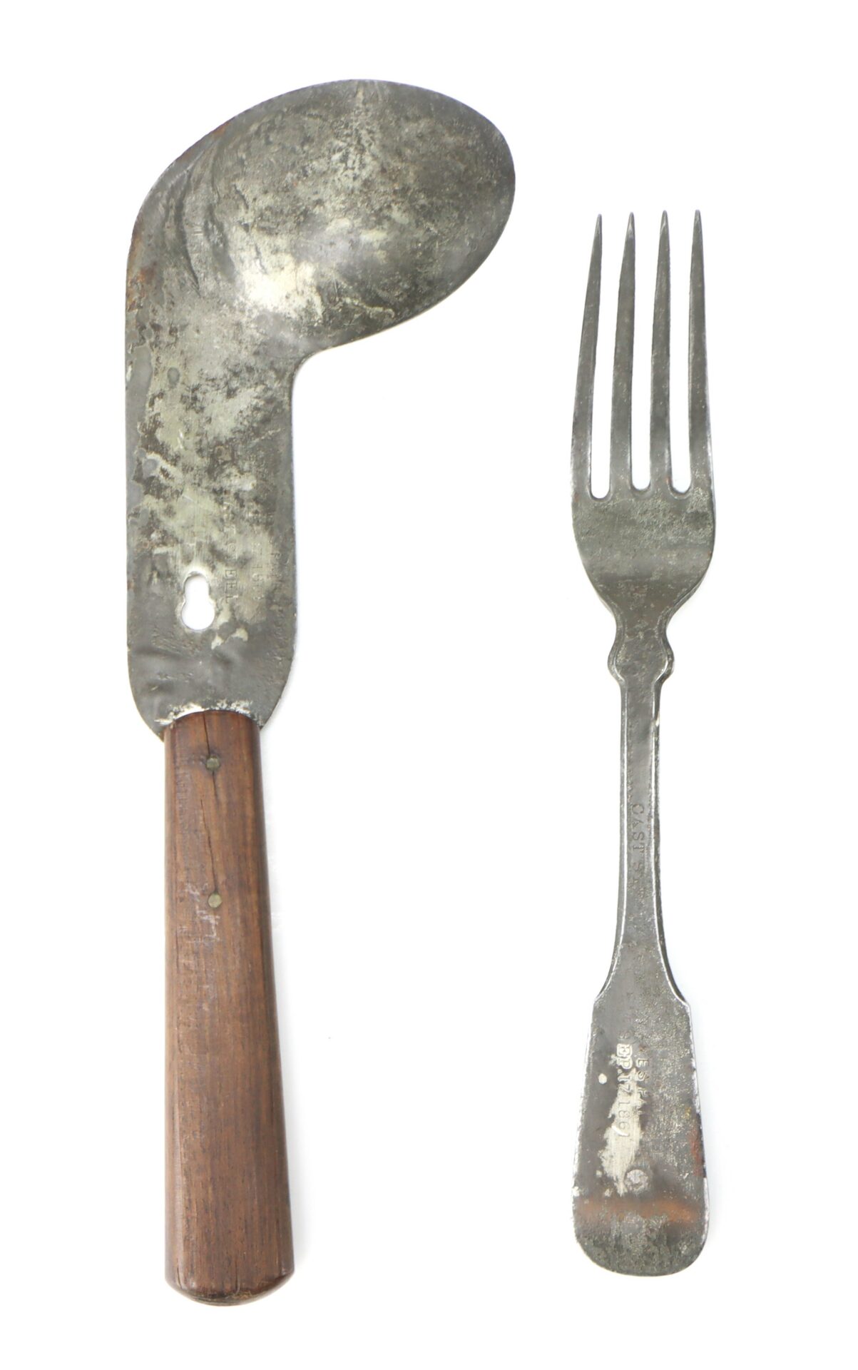 A metal fork and a large, curved metal spoon with a wooden handle are placed side by side on a white background.
