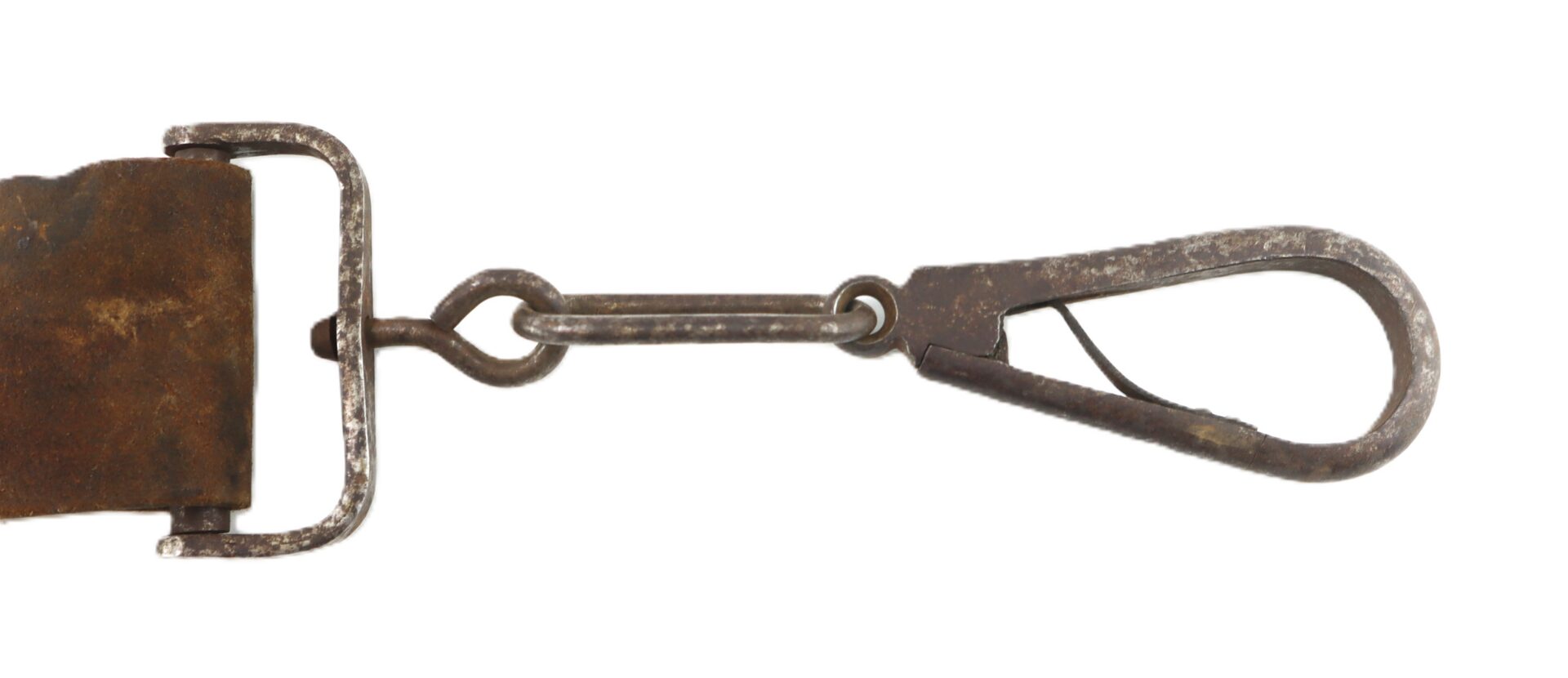 A close-up of a rusty metal clasp attached to a worn leather strap, isolated on a white background.