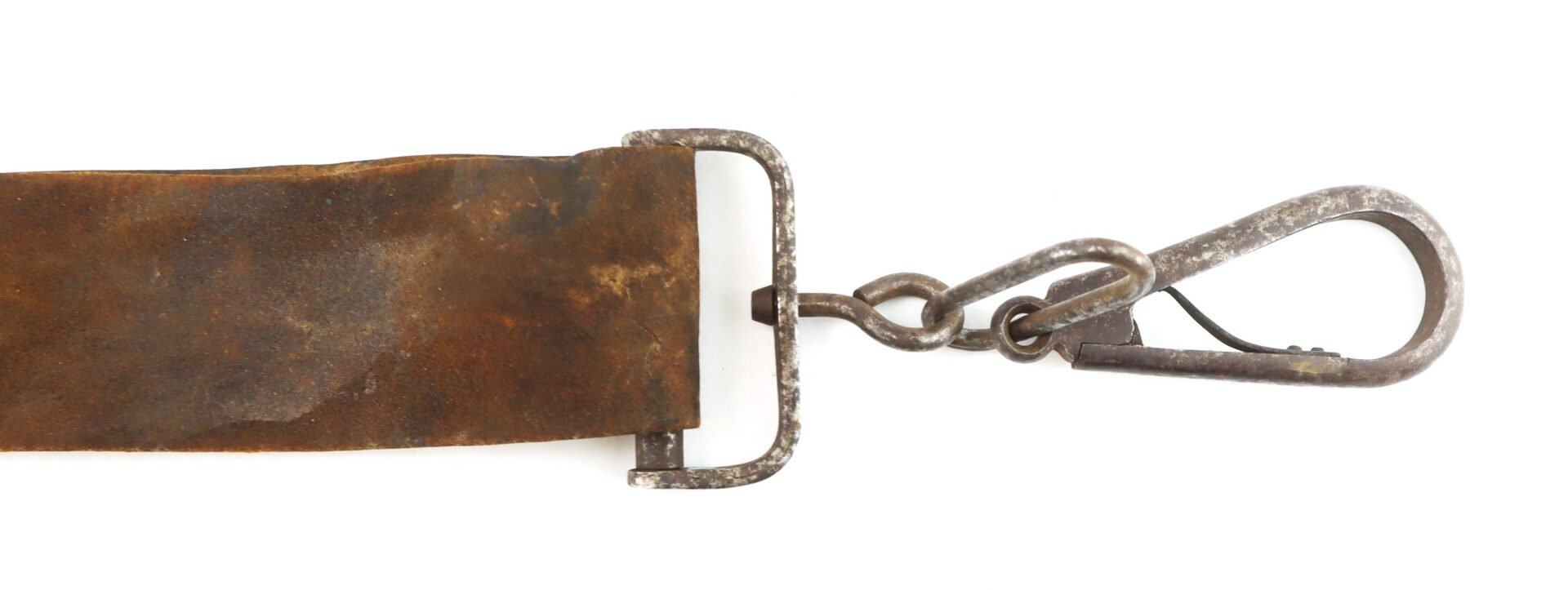 Close-up of a rusted metal clasp attached to a worn brown leather strap, isolated on a white background.