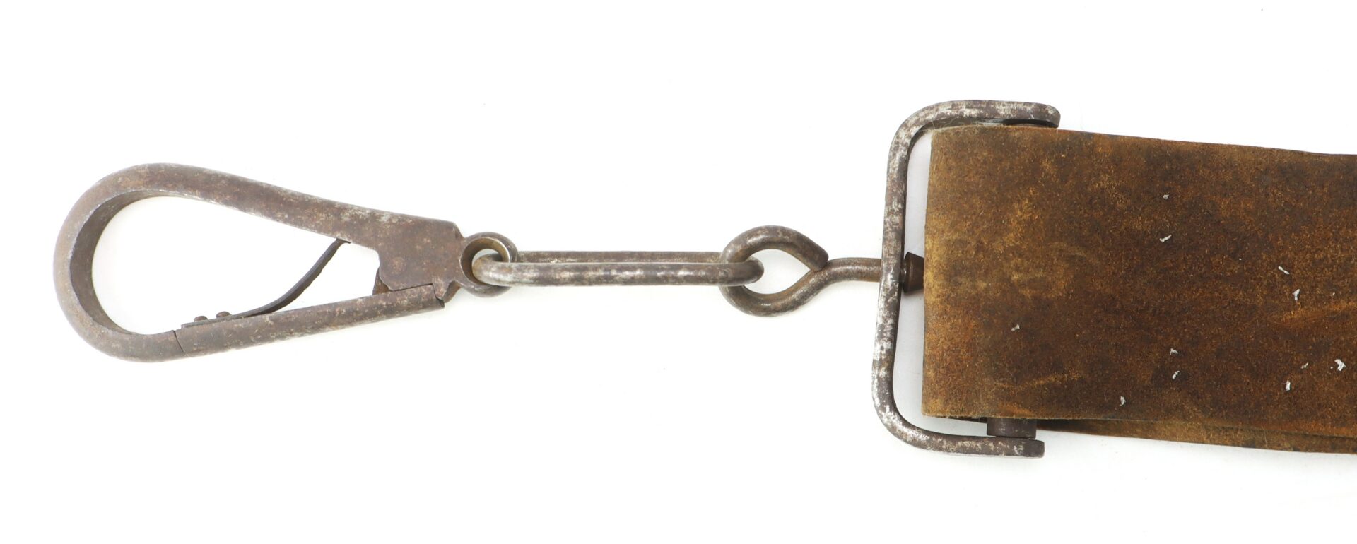 Close-up of a weathered metal clasp attached to a brown leather strap, isolated on a white background.
