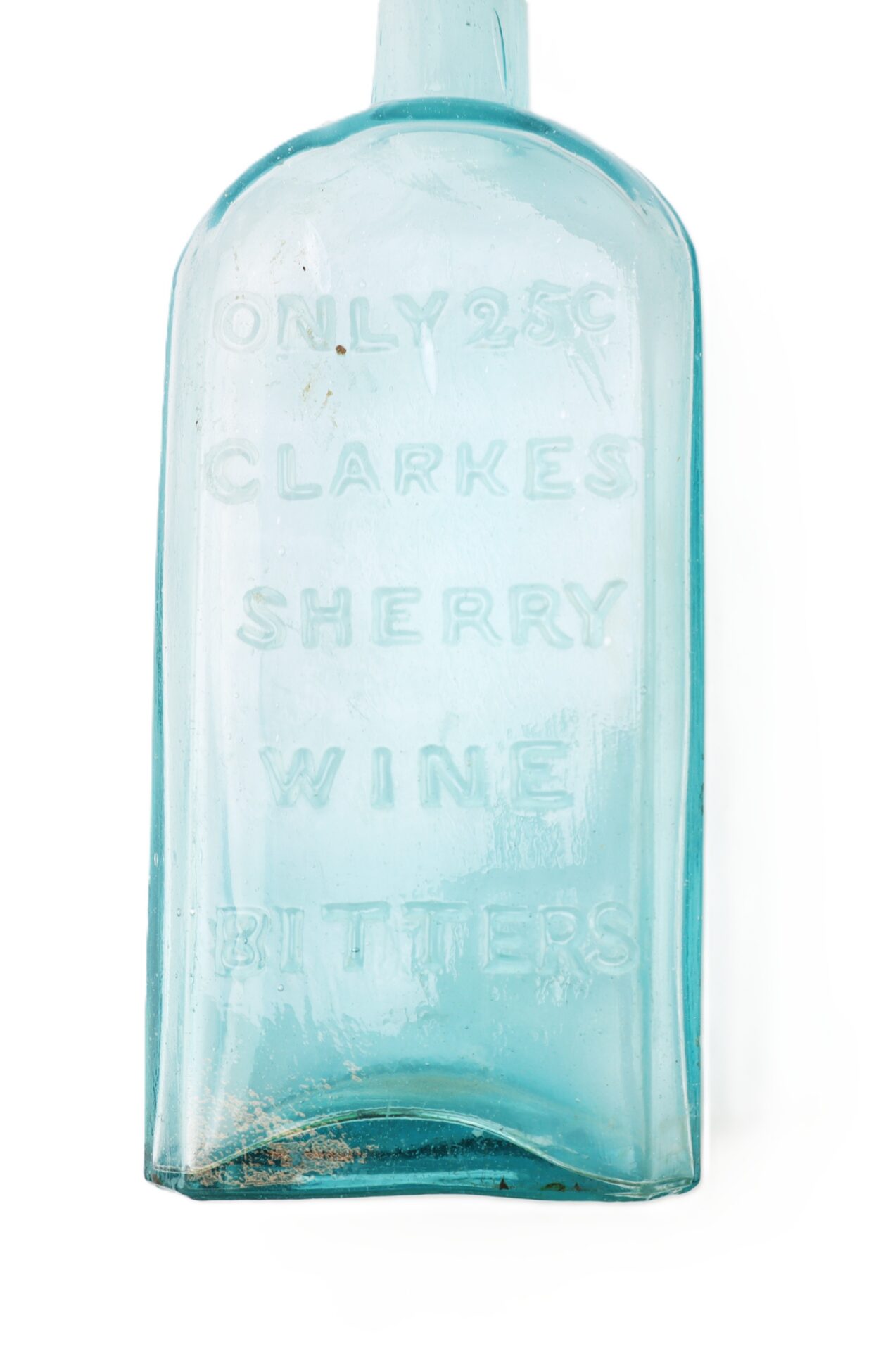 A blue glass bottle embossed with the words "ONLY 25¢ CLARKES SHERRY WINE BITTERS" on the front.