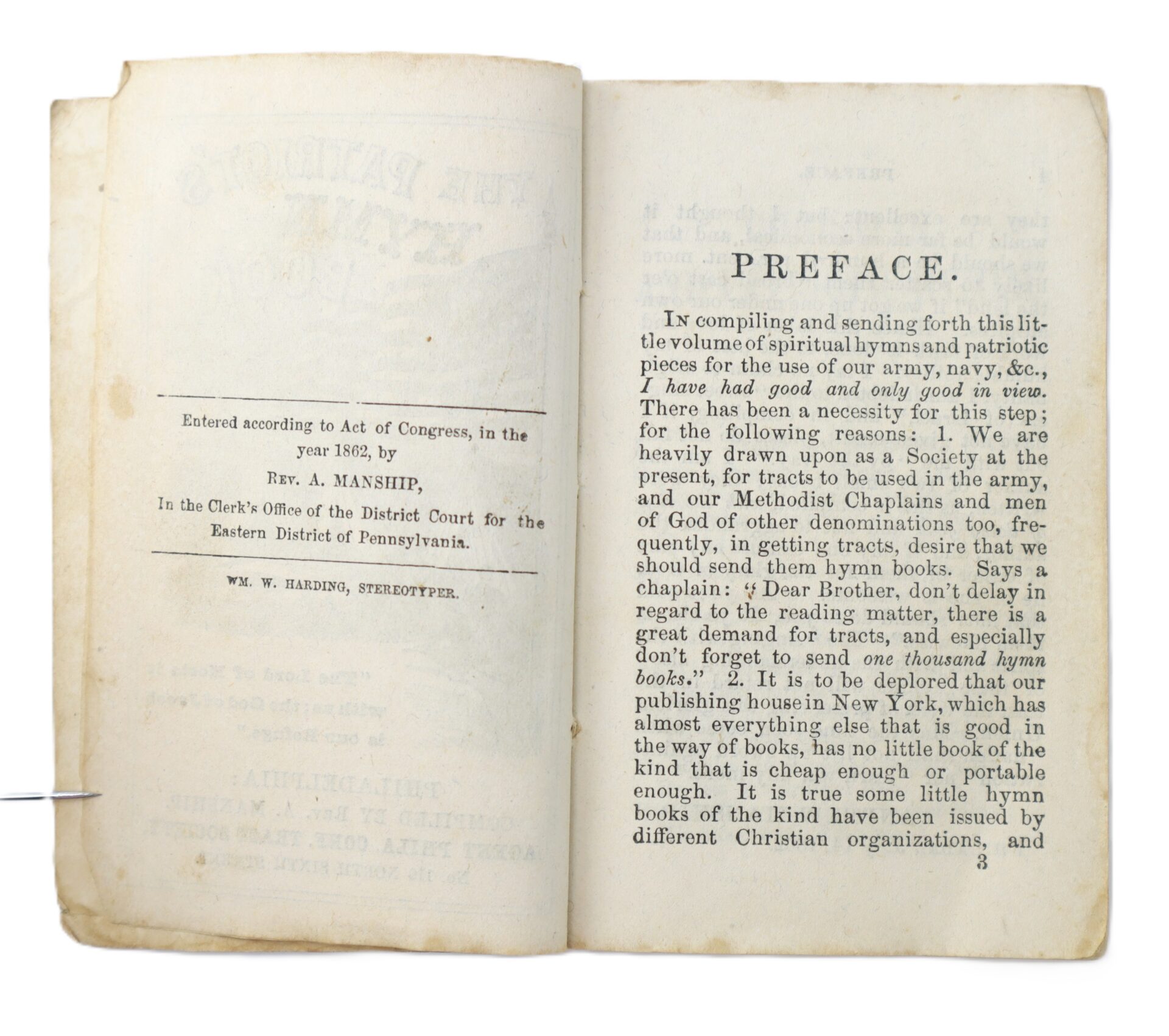 Open book showing a preface discussing the need for spiritual materials for the army, mentioning a lack of hymn books and tracts, and referencing Christian denominations and Methodist chaplains.