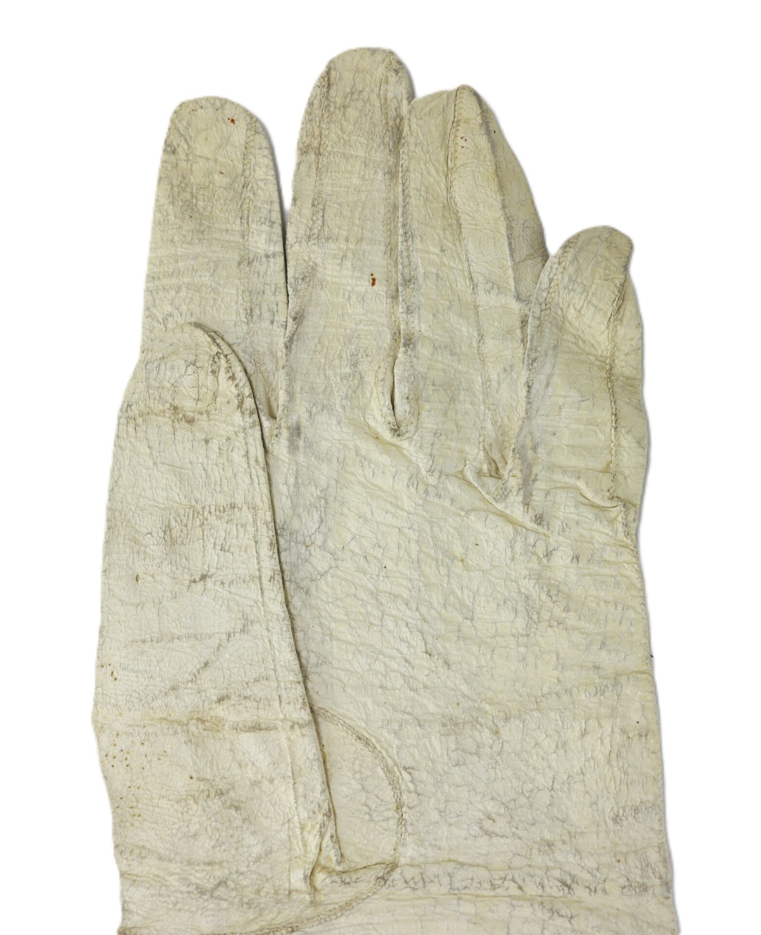 A single old, white leather glove with visible wrinkles and texture, displayed palm up against a plain white background.