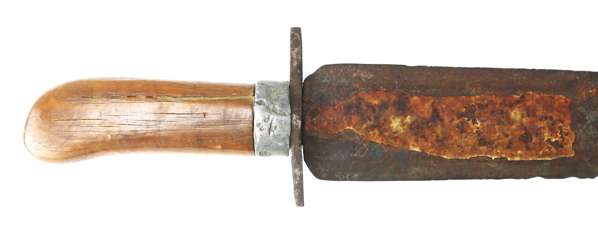 Close-up of an old knife with a wooden handle and a heavily rusted metal blade.