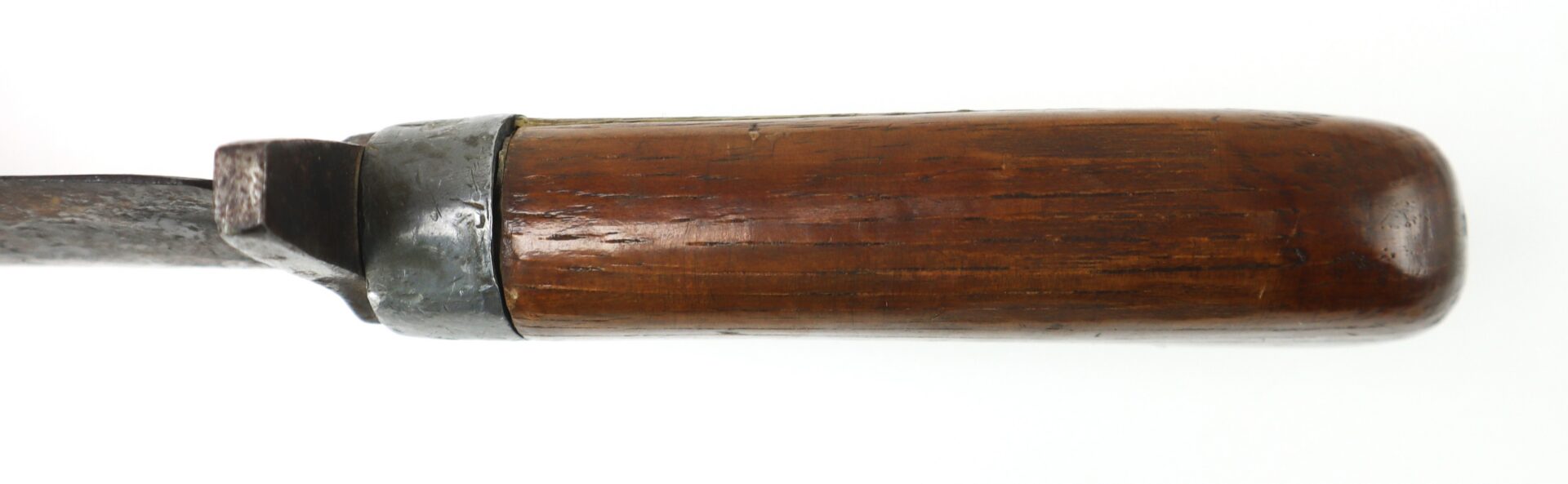 Close-up of a wooden handle attached to a metal tool, viewed from above on a white background.