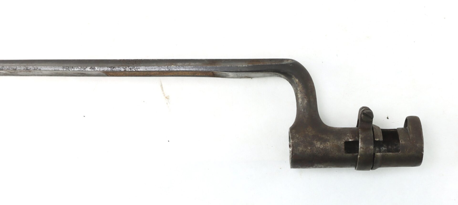 A metal bayonet with a cylindrical socket and locking ring, showing signs of wear and rust, displayed on a white background.