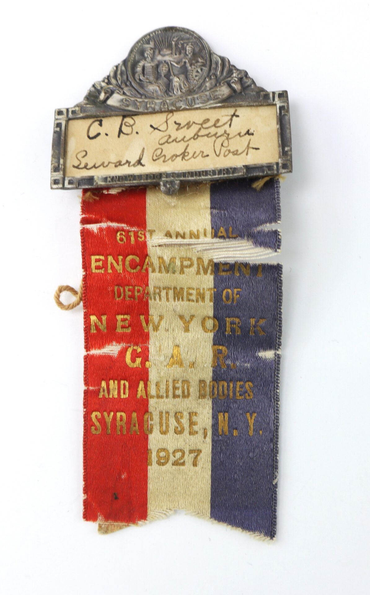 Antique ribbon badge for the 61st Annual Encampment, Department of New York G.A.R., Syracuse, NY, 1927, with a handwritten name tag reading "C.B. Sweet, Edward Croker Post.