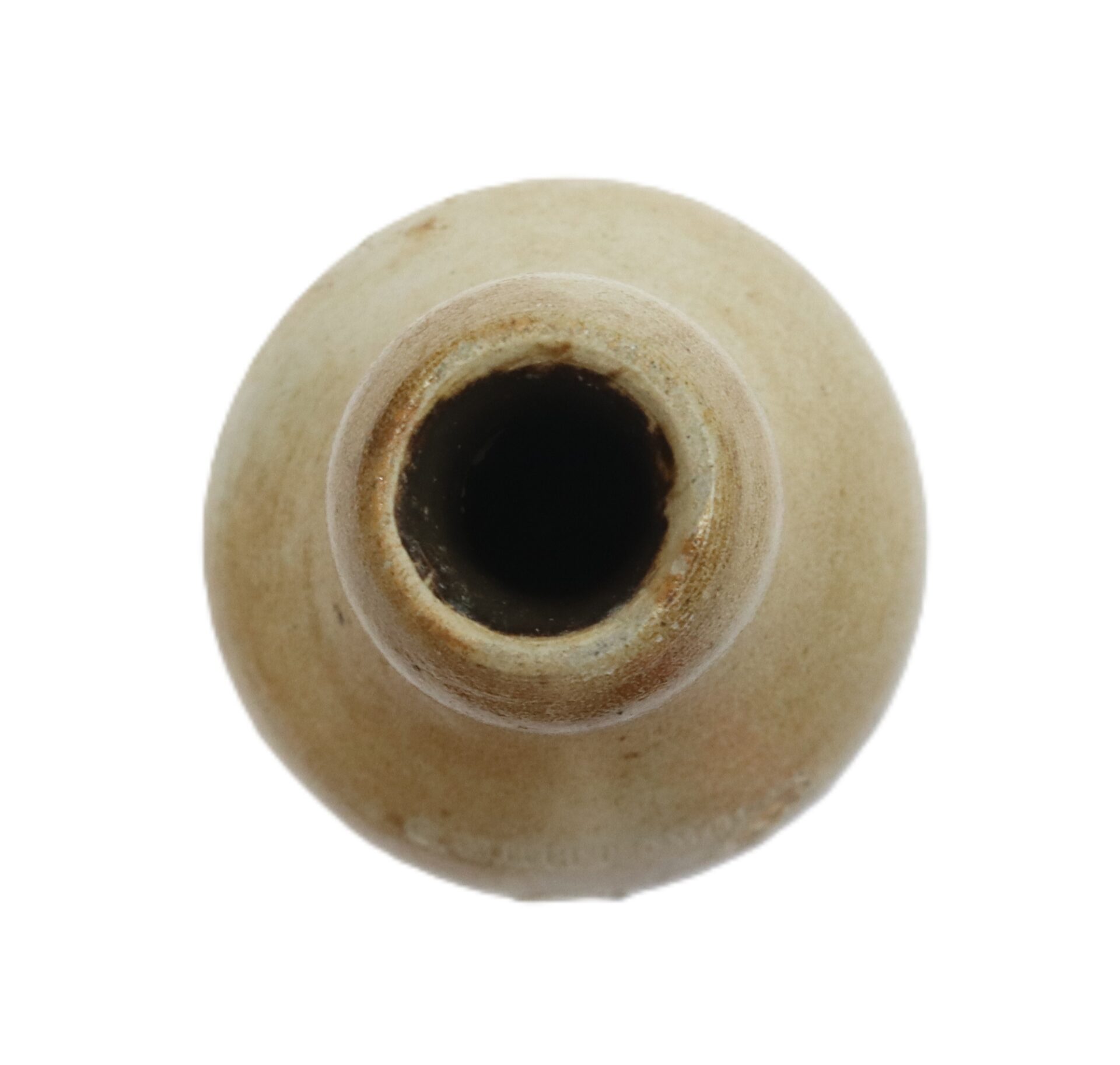 Top view of a round, beige ceramic bottle with a narrow neck and an open mouth against a white background.