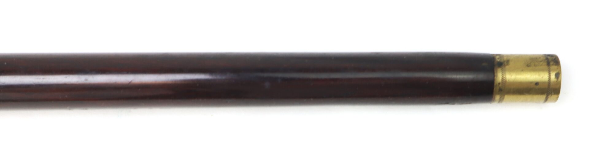 A close-up of the Civil War–Era Fife with Brass Fittings, Gettysburg Provenance, shows its dark wooden rod and capped end against a white background.