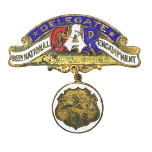A vintage Delegate badge from the 35th National Encampment of the C.A.R., dated September 8–14, featuring a scenic medallion hanging below.