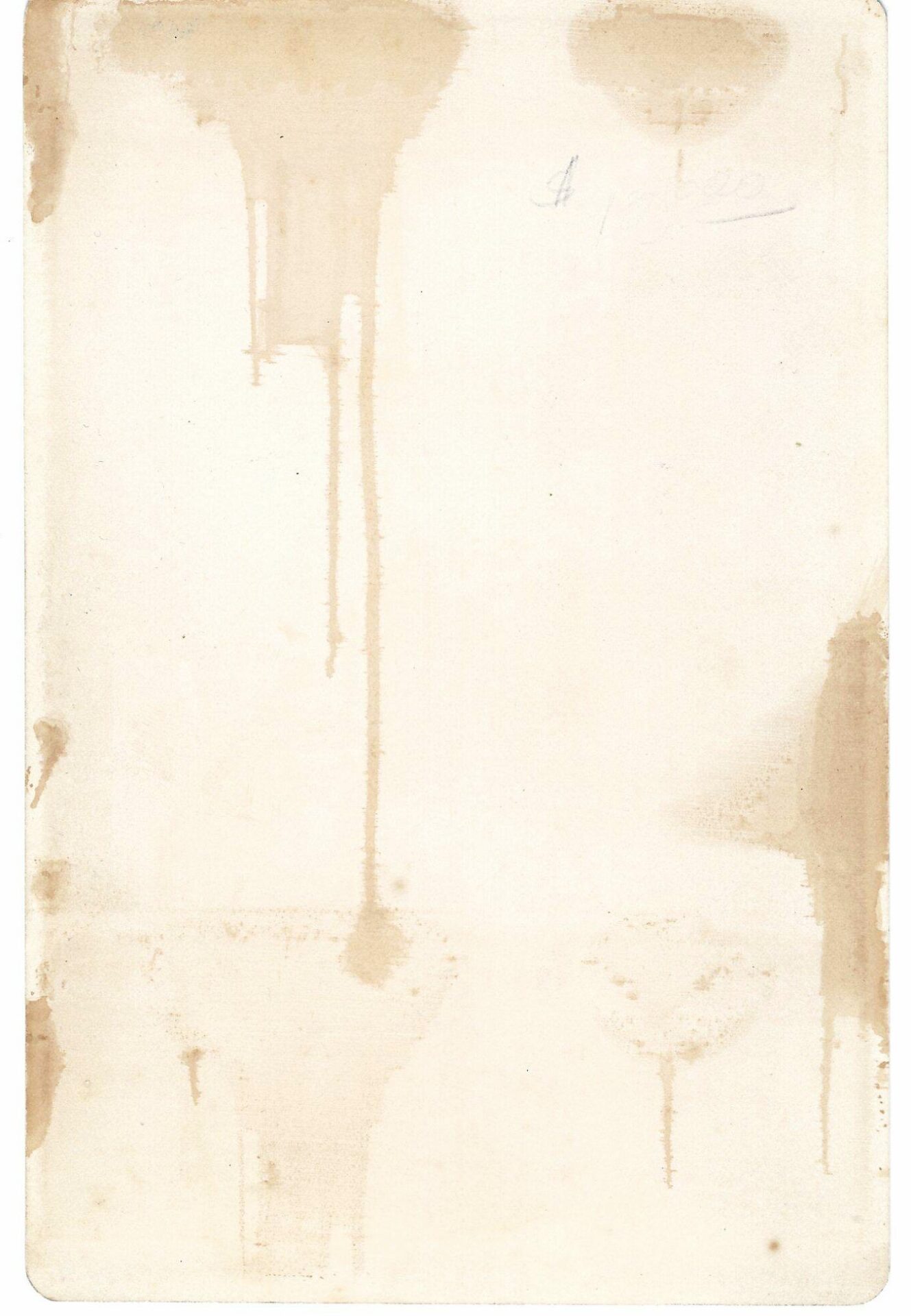 A rare albumen photograph of the Emancipation Memorial in Washington, D.C., featuring an off-white surface with several brown water stains and marks.