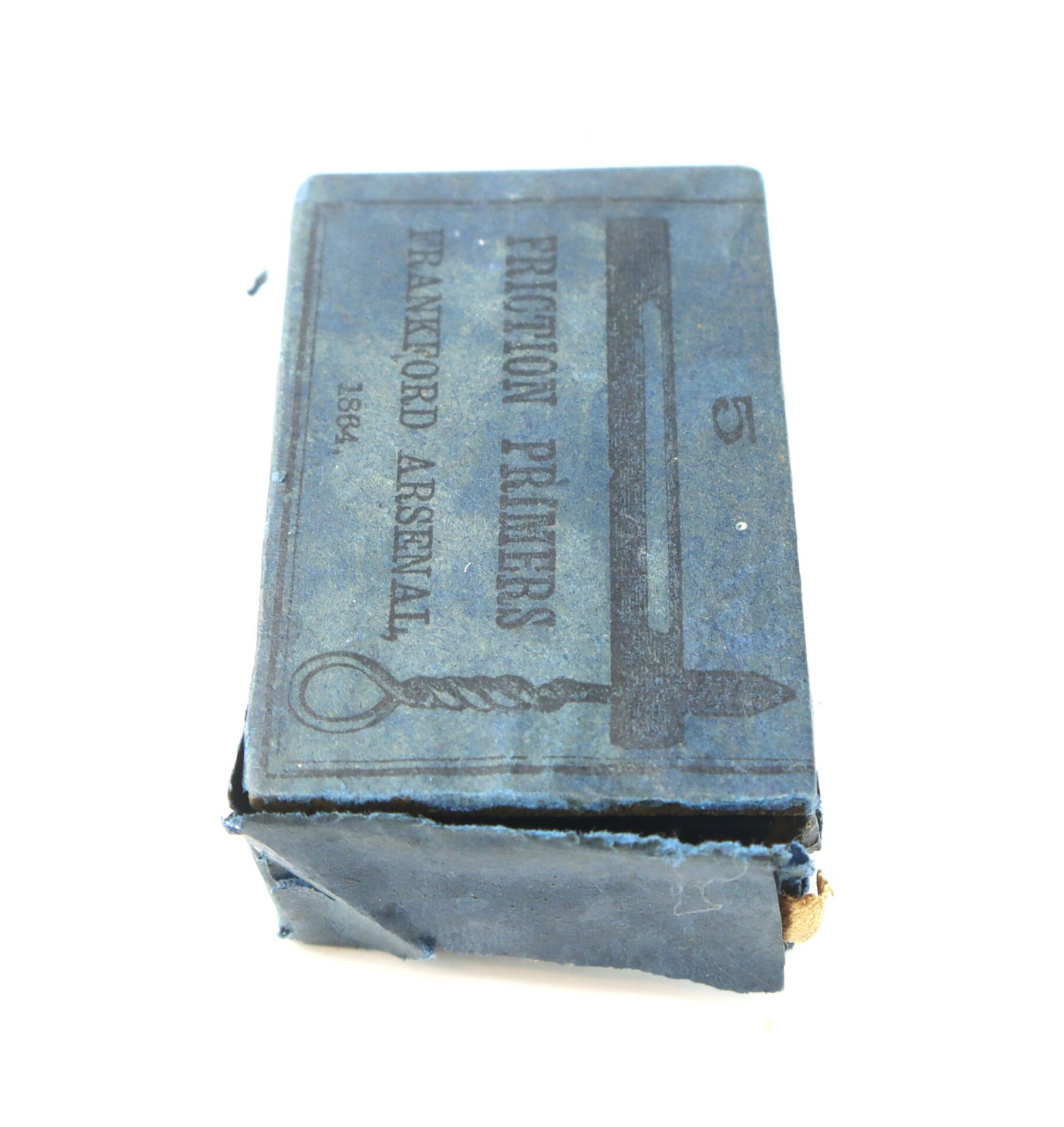 A blue box labeled "Friction Primers, Frankford Arsenal, 1864" with a depiction of a primer, slightly worn and partially open.
