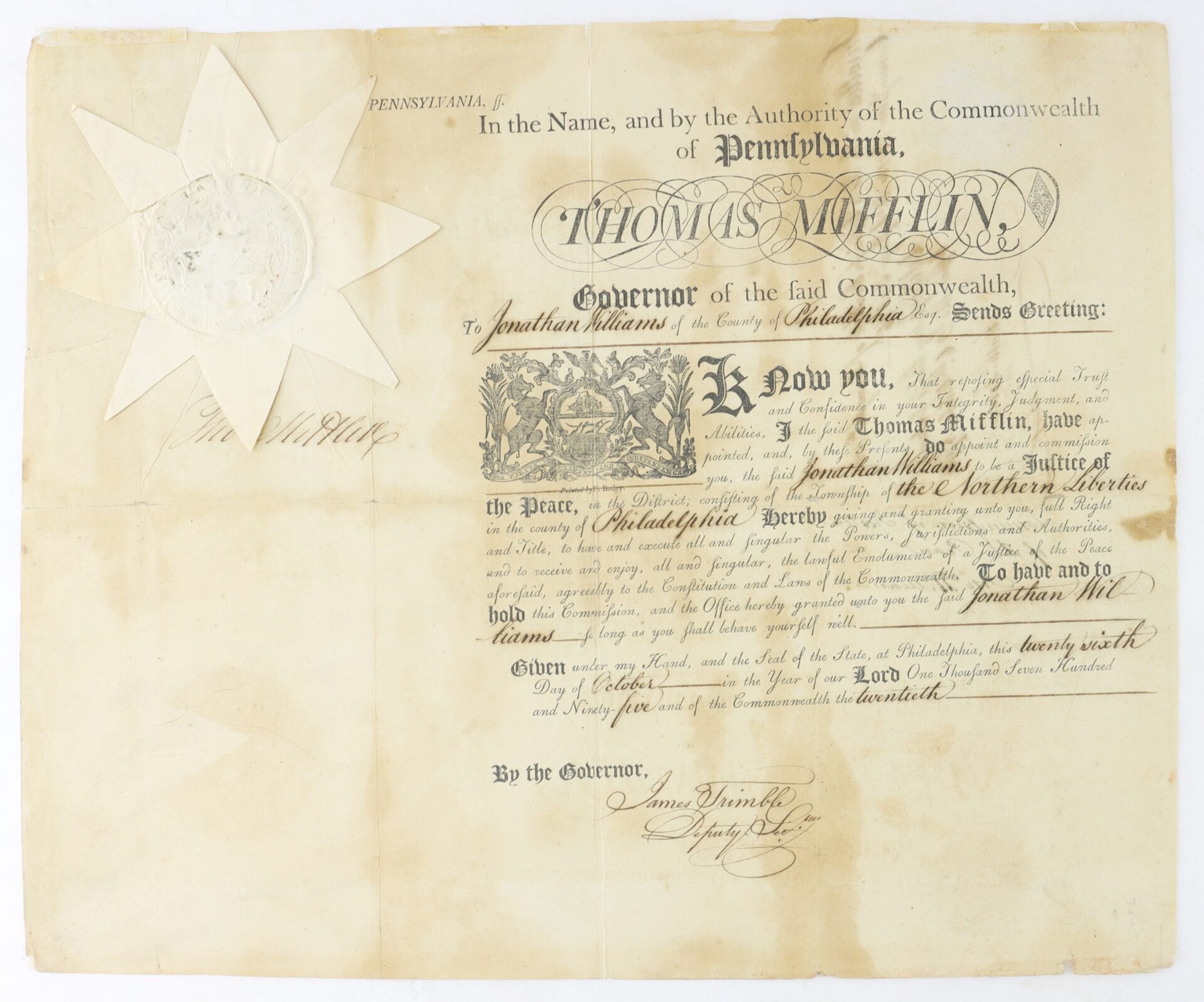 A historical certificate from Pennsylvania appointing Jonathan Williams as a justice of the peace, featuring handwritten text, signatures, and an embossed seal.