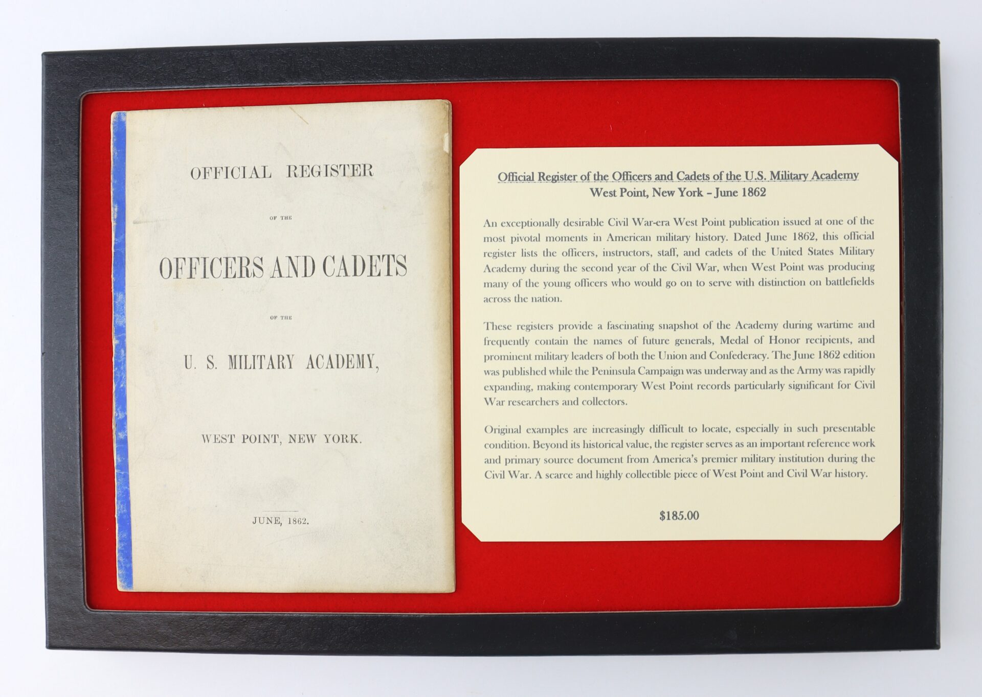 Framed display containing an 1862 “Official Register of the Officers and Cadets of the U.S. Military Academy” booklet and a descriptive card about its historical context and value.