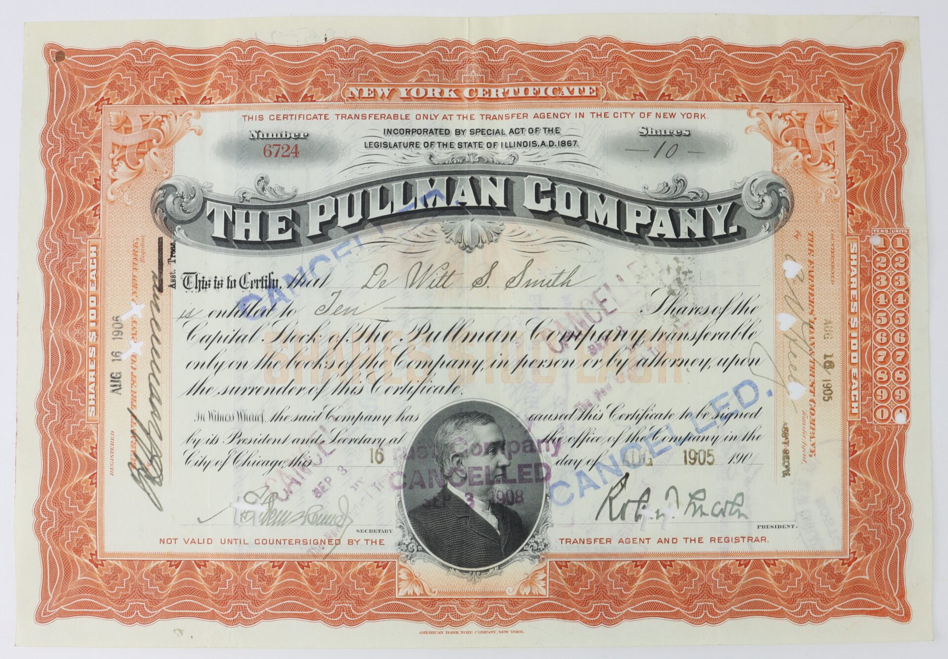 An orange and black stock certificate from The Pullman Company issued in 1905, marked "CANCELLED" with signatures, ornate borders, and an embossed company seal.