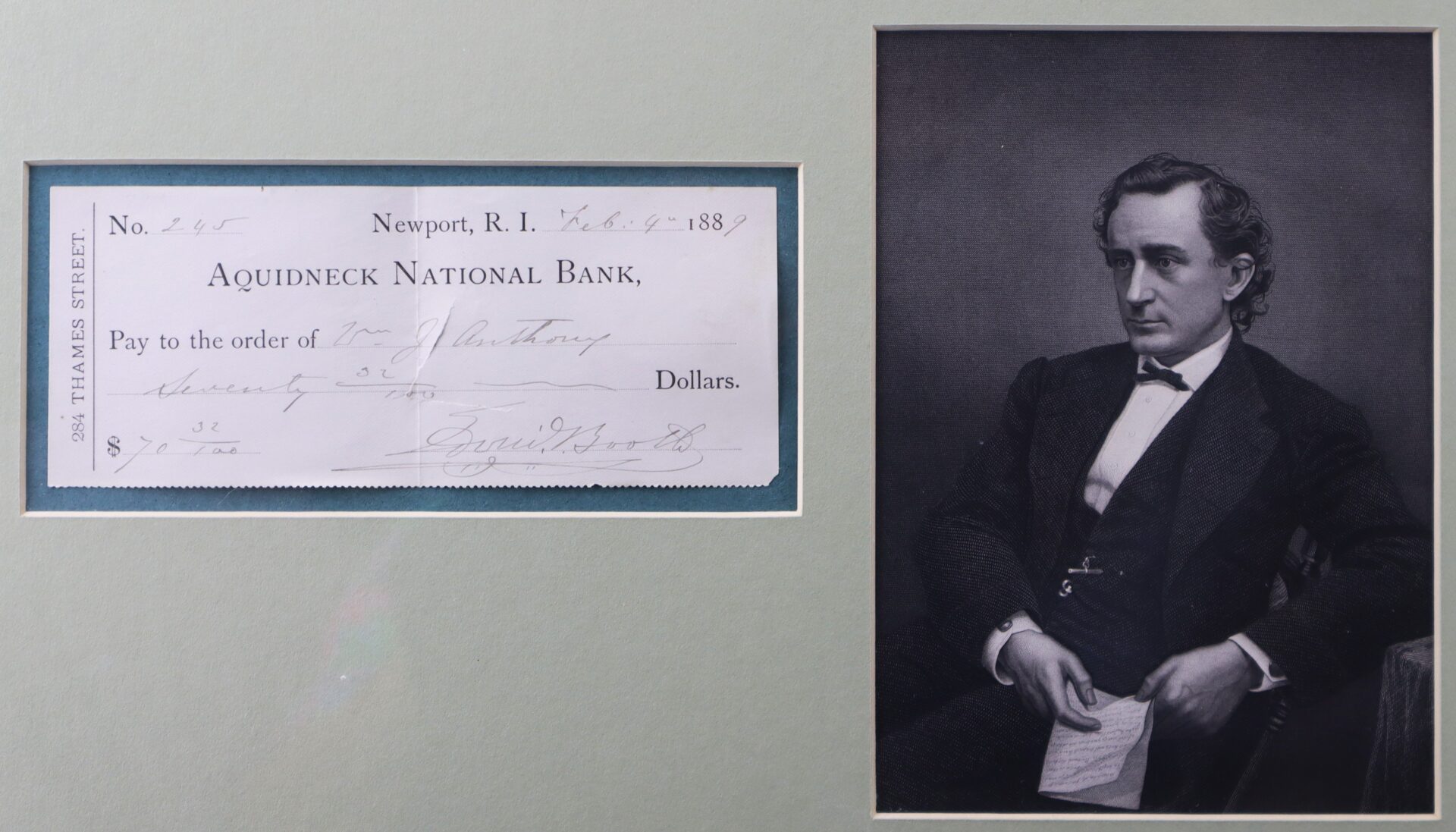 A historic black-and-white portrait of a seated man in formal attire is shown next to an 1888 Aquidneck National Bank check from Newport, R.I., signed by E. H. Stoddard.