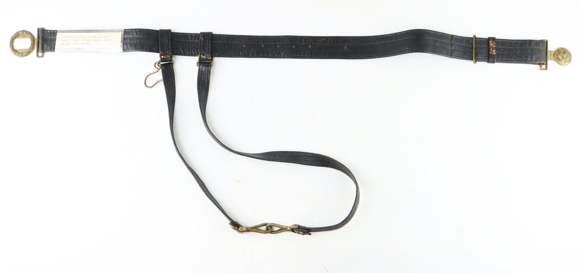 A black leather military belt with metal buckles and two hanging straps, displayed horizontally against a white background.