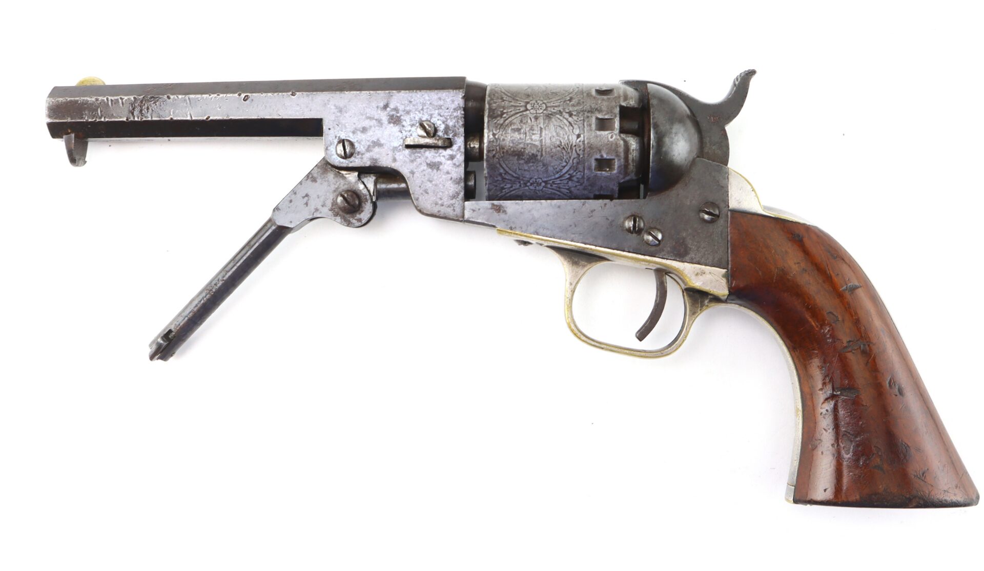 A vintage revolver with a partially open loading lever, engraved cylinder, and wooden grip, displayed on a white background.